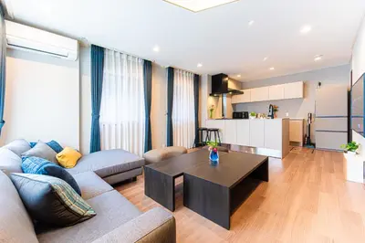 a living room with a couch and a coffee table at Poka villa aoyama - Vacation STAY 19050 in Tokyo
