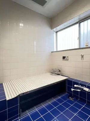a room with a blue tiled floor and aptionasteryasteryasteryasteryastery at Takara\u8c4a\u5cf6\u5712101 NR0434 in Tokyo