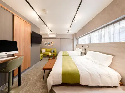 a hotel room with a large bed and a television at Akihabara Sta 13min, Kanda Sta 10min,Ogawamachi 2min,Hotel Prime Inn Kanda, in Tokyo