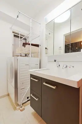 a bathroom with a sink and a washing machine at V Close to Kikukawa sta 14 min to Akihabara in Tokyo