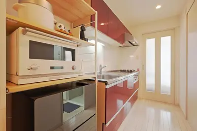 a kitchen with a sink and a microwave at V Close to Kikukawa sta 14 min to Akihabara in Tokyo