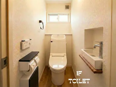 a small bathroom with a toilet and a sink at MEME Villa 5BR - 3 Separate Toilets & 3 Showers - 10Gbps Wifi in Tokyo