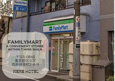 a building with a sign in front of it at MEME Villa 5BR - 3 Separate Toilets & 3 Showers - 10Gbps Wifi in Tokyo