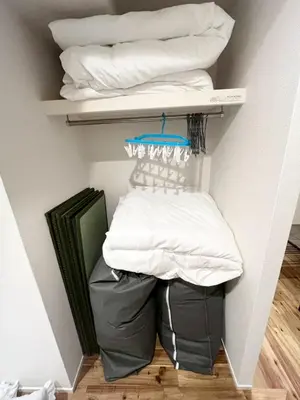 a closet with white pillows in a room at Yotsugi Hotel Asakusa Skytree in Tokyo