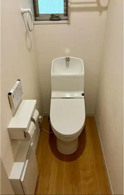 a small bathroom with a toilet and a sink at Tokyo Bauhaus in Tokyo