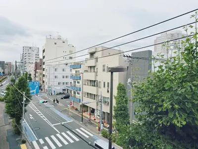 a view of a city street with buildings at Tokyo Hakusan Louis Apartment near TOKYO DOME close to Yamanote Line in Tokyo