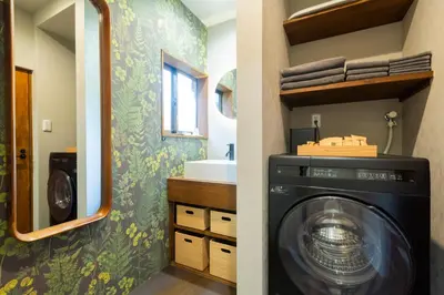 a laundry room with a washing machine in a bathroom at HOTEL RIN TOKYO - Private Townhouse - in Tokyo