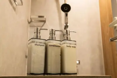two oxygen cylinders sitting on a shelf in a bathroom at Nestry Asakusa 403\u53f7\u5ba4 in Tokyo