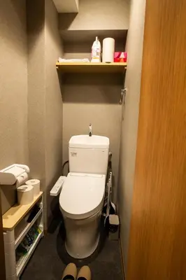 a bathroom with a toilet in a small room at Nestry Asakusa 403\u53f7\u5ba4 in Tokyo