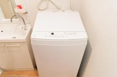 a white refrigerator in a bathroom with a sink at Year-end promotion Shinjuku 401 Great Location 2 mins to S Station New Building Max for 6 people in Tokyo