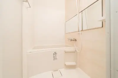a white bathroom with a sink and a toilet at Year-end promotion Shinjuku 401 Great Location 2 mins to S Station New Building Max for 6 people in Tokyo