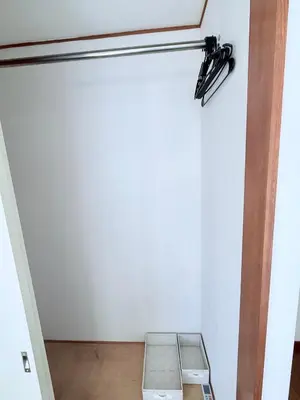 a room with a white wall and a door at Terrace Stay Omori in Tokyo
