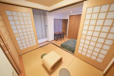 a view of a room with a door and a room with a chair at Jazz Building 4F5F - Vacation STAY 28953v in Tokyo
