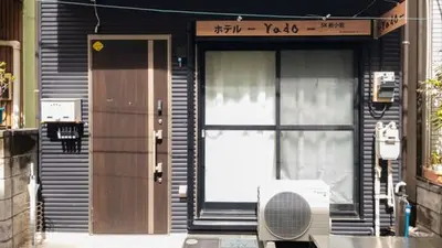 a front door of a house with a sign on it at Hotel Yado SK Shinkoiwa - Vacation STAY 17432v in Tokyo