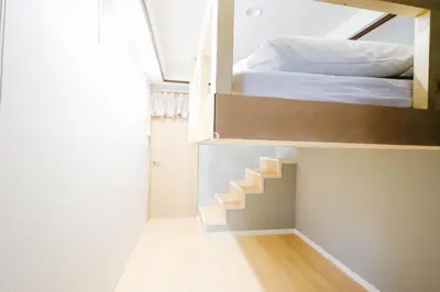 a bedroom with a bunk bed and a staircase at Shinjuku 2bed rooms apartment#2室1厅#智能马桶#高速无限制网路1 in Tokyo