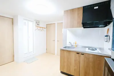 a kitchen with a sink and a stove at Shinjuku 2bed rooms apartment#2室1厅#智能马桶#高速无限制网路1 in Tokyo