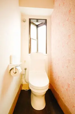a bathroom with a white toilet with a window at Shinjuku 4bed rooms apartment#4室2厅2浴室2卫生间#智能马桶#高速无限制网路3&1 in Tokyo