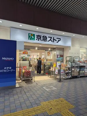 a man standing in the entrance of a store at 15min from Haneda Airport Cozy for 3 in Tokyo