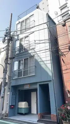 a blue building with a balcony on the side of it at OpenSale Shinjuku 301 New Building 2mins to Waseda Station Max for 3 people in Tokyo