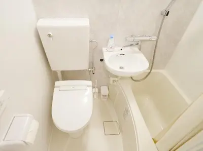 a small bathroom with a toilet and a sink at OpenSale Shinjuku 302 New Build 2mins to Waseda Station Max for 2 people in Tokyo