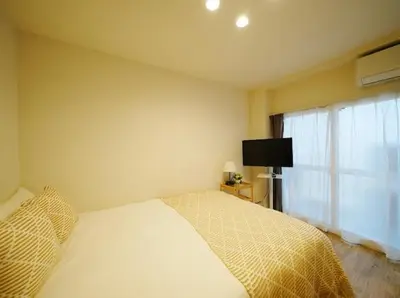 a bedroom with a white bed and a window at OpenSale Shinjuku 302 New Build 2mins to Waseda Station Max for 2 people in Tokyo