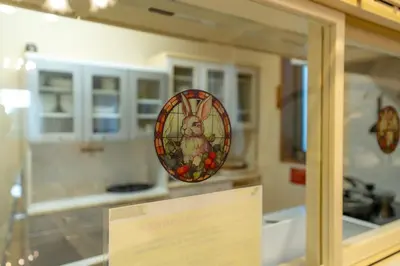 a sign in a window with a stained glass plate at Tokyo Koiwa European Luxury Mansion 4 Bedrooms2 ToiletsEV HanedaNarita Direct Max 8 Guests in Tokyo