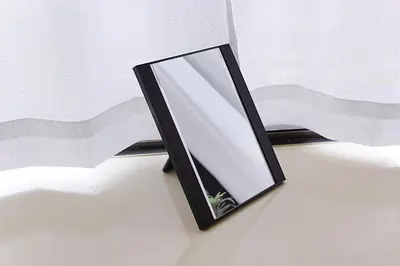 a mirror sitting on top of a table at Unite Stay URAYASU 101 8 minutes by car or 15 minutes by bus to Disneyland in Tokyo