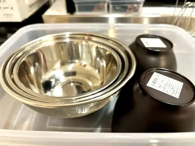 a drawer with a container and a bowl and a container of sauce at Yama Hotel Akabane 201 in Tokyo