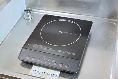 a dvd player is sitting on top of a machine at Aoi Bld 1F in Tokyo