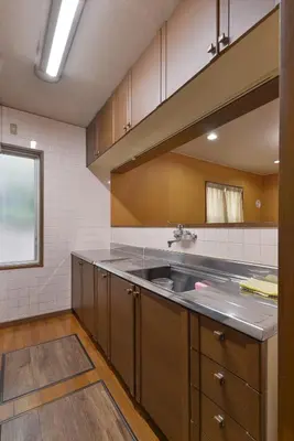 a kitchen with a sink and a counter top at Aoi Bld 1F in Tokyo