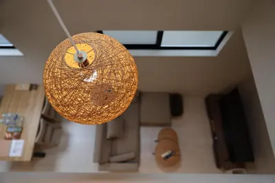 a chandelier hanging from the ceiling of a room at Tabi in Tokyo in Tokyo