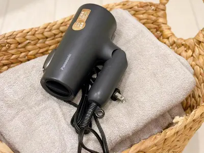 a hair dryer sitting on top of a basket at Tabi in Tokyo in Tokyo