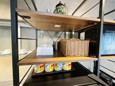 a shelf with food and a basket on it at \u7af9\u9db4\u65c5\u9928 in Tokyo