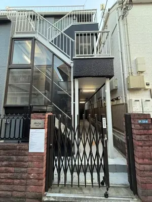 a house with a staircase and a stair railing at \u963f\u4e45\u6d25\u30cf\u30a4\u30c4102 in Tokyo