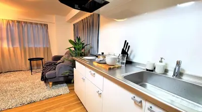 a kitchen with a sink and a counter top at Walking distance to Sunshine, families are welcome and easy to live in in Tokyo