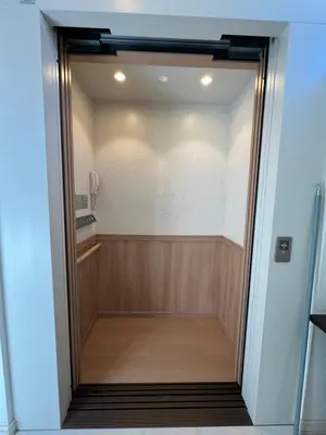 a glass door leading into a walk in shower at Private Room with elevator only 2 minutes to station in Tokyo