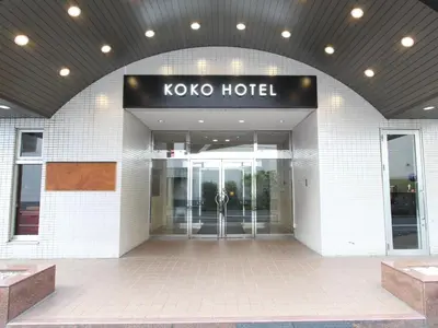 a koto hotel entrance with a sign on it at KOKO HOTEL Tokyo Nishikasai in Tokyo