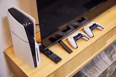a desk with a computer monitor and a keyboard at IoTele Minami-Aoyama in Tokyo