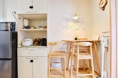 a small kitchen with a small table and chairs at Tokoryokan - Takasago - Vacation STAY 20335v in Tokyo