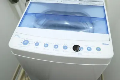 a white washing machine sitting in a room at Heisei Mansion - Vacation STAY 19183 in Tokyo