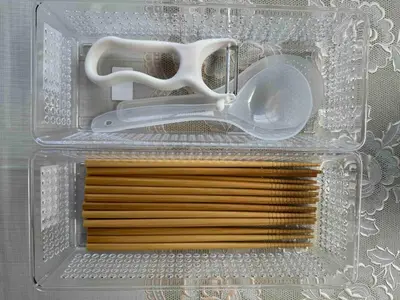 a plastic container with a pair of scissors and a comb at Direct to Akihabara Shinjuku Max 6 people in Tokyo
