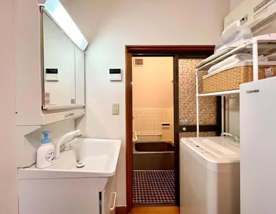 a small bathroom with a sink and a toilet at Direct to Akihabara Shinjuku Max 6 people in Tokyo