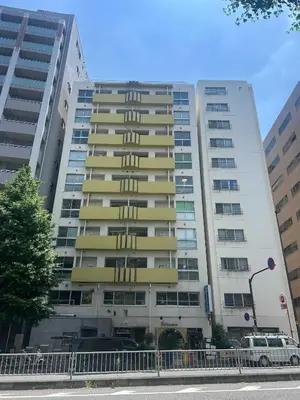 a large apartment building in a city at illi Pal Shinagawa Gotanda in Tokyo