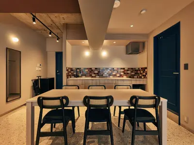 a conference room with a table and chairs at illi Pal Shinagawa Gotanda in Tokyo