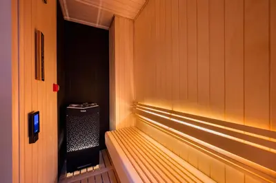 a wooden bench in a room with at HOTEL MINATO Azabu-juban in Tokyo