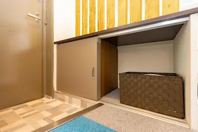 ajar door of a closet with a staircase at ksi\u5357\u5e38\u76e4\u53f0301 in Tokyo