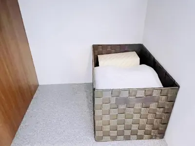 a small bed in a corner of a room at ksi\u5357\u5e38\u76e4\u53f0301 in Tokyo