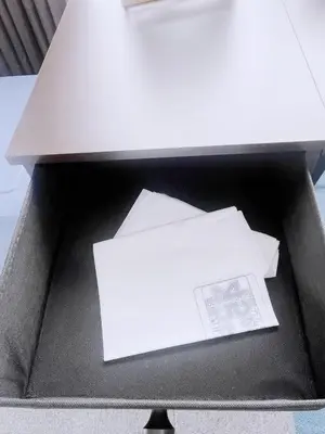 a box with papers and a money in it at ksi\u5357\u5e38\u76e4\u53f0301 in Tokyo