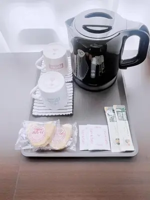 a coffee pot and some food on a tray at ksi\u5357\u5e38\u76e4\u53f0301 in Tokyo