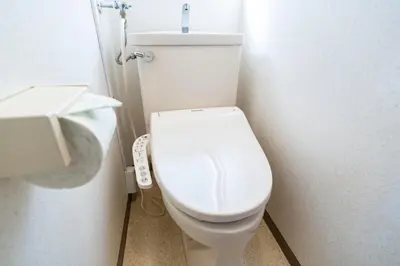 a bathroom with a white toilet in a stall at 7th floor 701 with elevator 40 square meters in the port area, close to Tokyo Tower, direct access to Haneda Airport in Tokyo